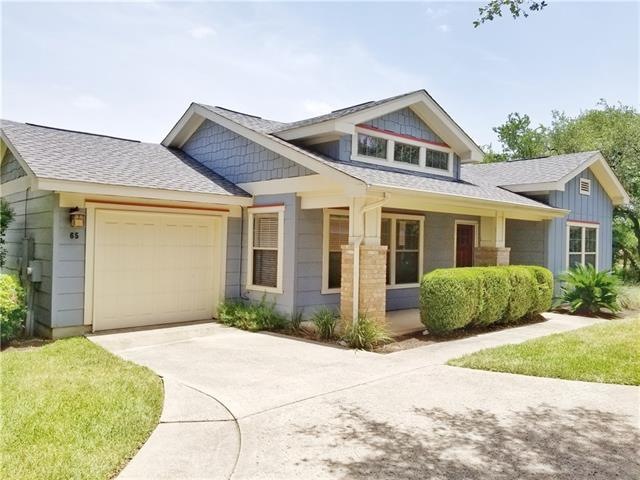 This condo is tucked away and is more like a house