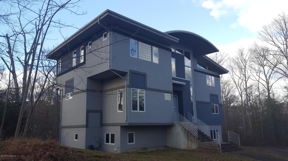 424 Tennent Rd, Morganville, NJ 07751 - photo 1