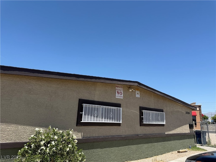 View of side of property with stucco siding