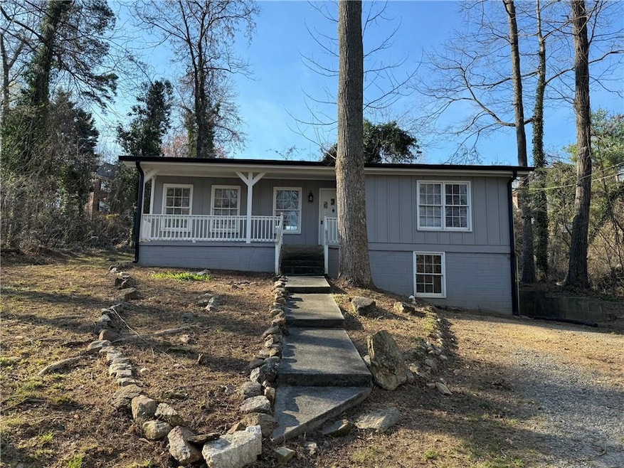 View of front of property featuring covered porch
