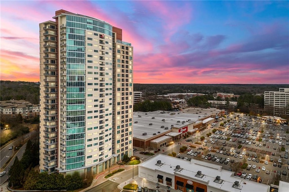 View of property at dusk
