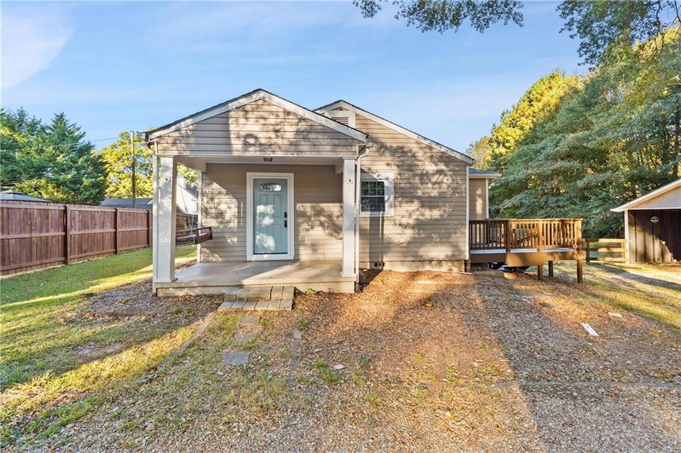 Bungalow-style home featuring a deck