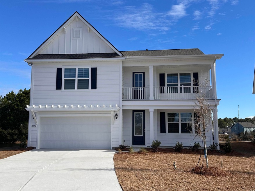 View of front of property with a garage