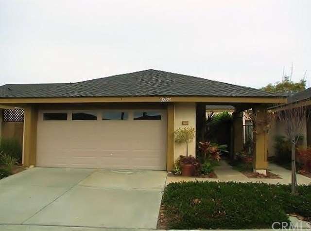 Front view with gated entry on right to lighted co