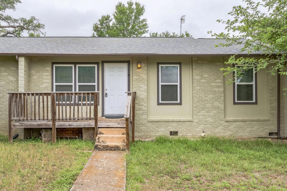 Single story home featuring crawl space, brick si