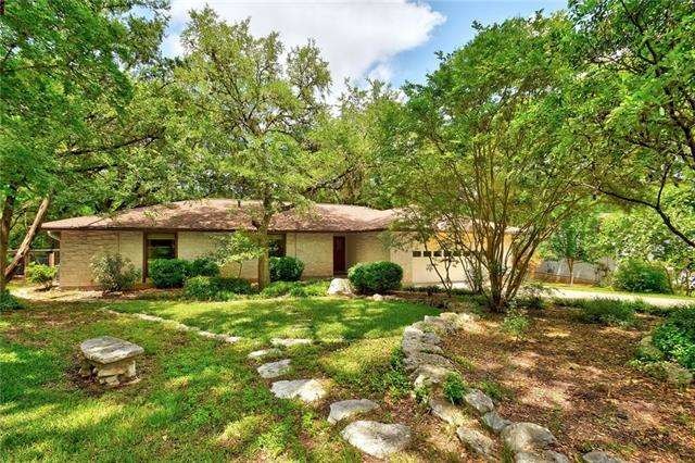 Beautiful curb appeal with mature landscaping.