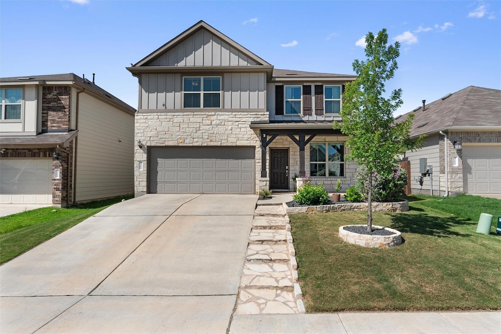 Craftsman-style home featuring board and batten s