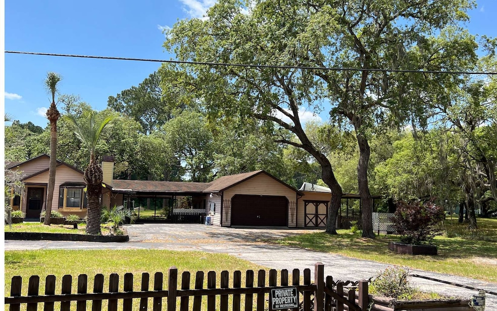 9360 N Cedar Cove Rd, Dunnellon, FL 34434 - photo 1