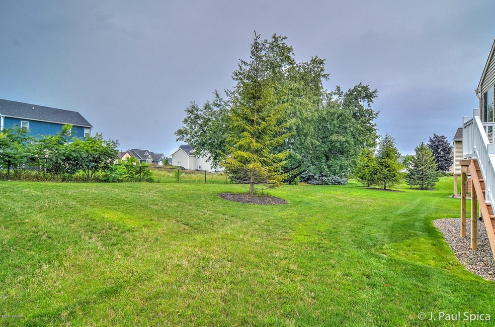 7345 Rock Canyon Dr SW unit 33, Byron Center, MI 49315 - photo 1