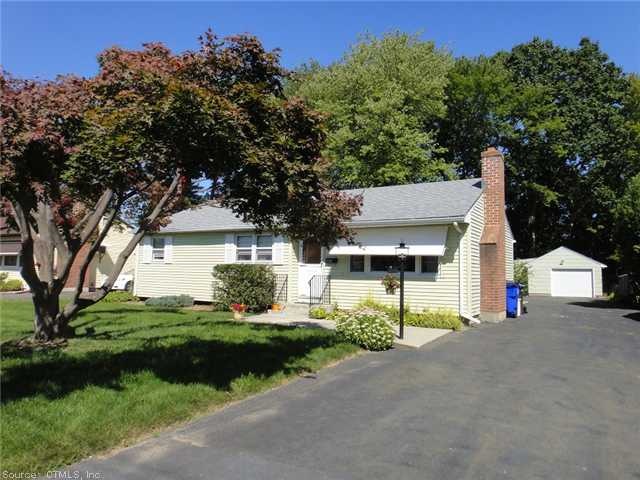 Exterior Front. Beautifully Landscaped Front Yard 