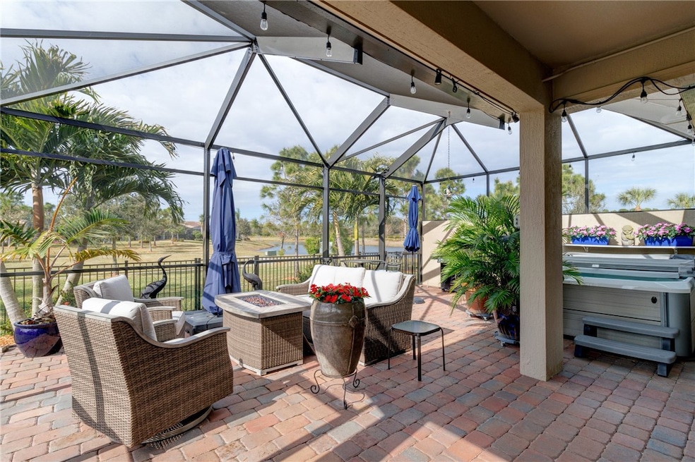 LOUNGE AREA WITH FIREPIT AND 10 X 12 UMBRELLA

