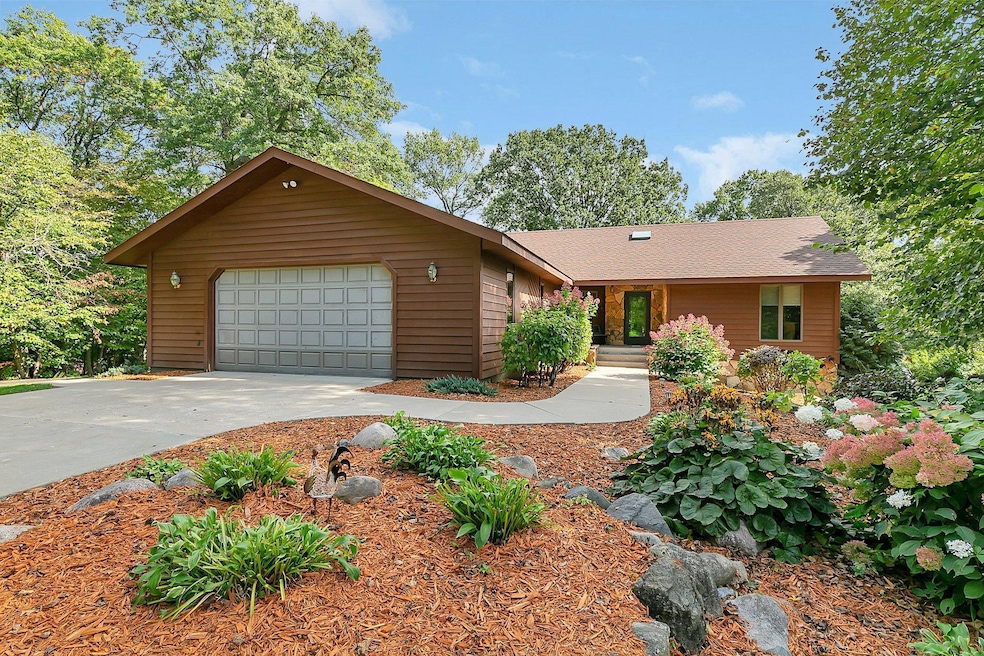 Gorgeous custom built Sartell home with beautiful landscaping