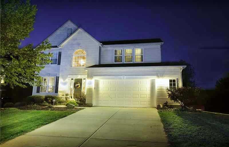 Exterior Front. Night Time View of a True Noblesville Beauty, Located on a Quiet Cul-de-sac lot