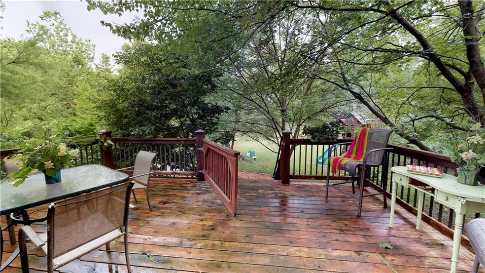 Beautiful view of the huge yard.  Behind the trees