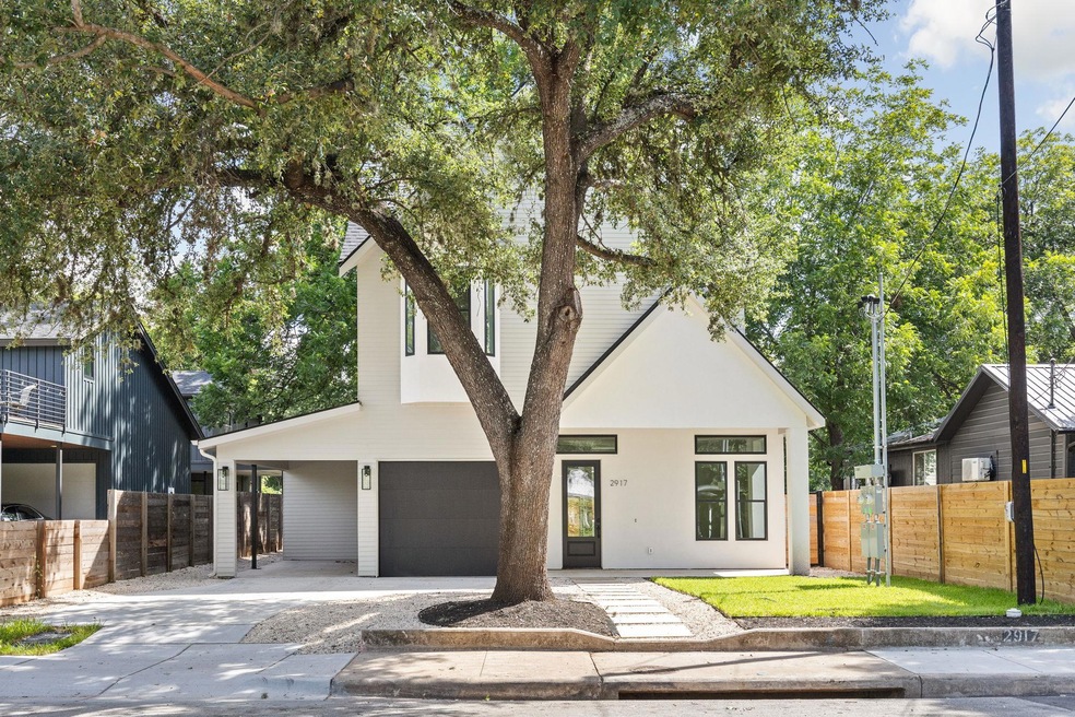View of front of home featuring concrete driveway
