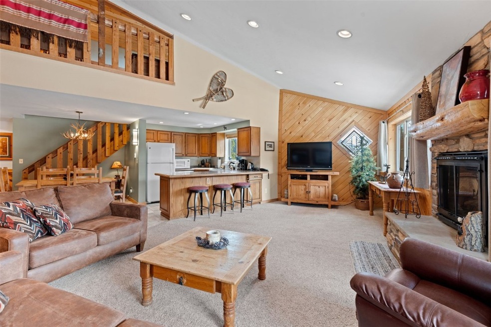 Large living room with vaulted ceilings & open lay
