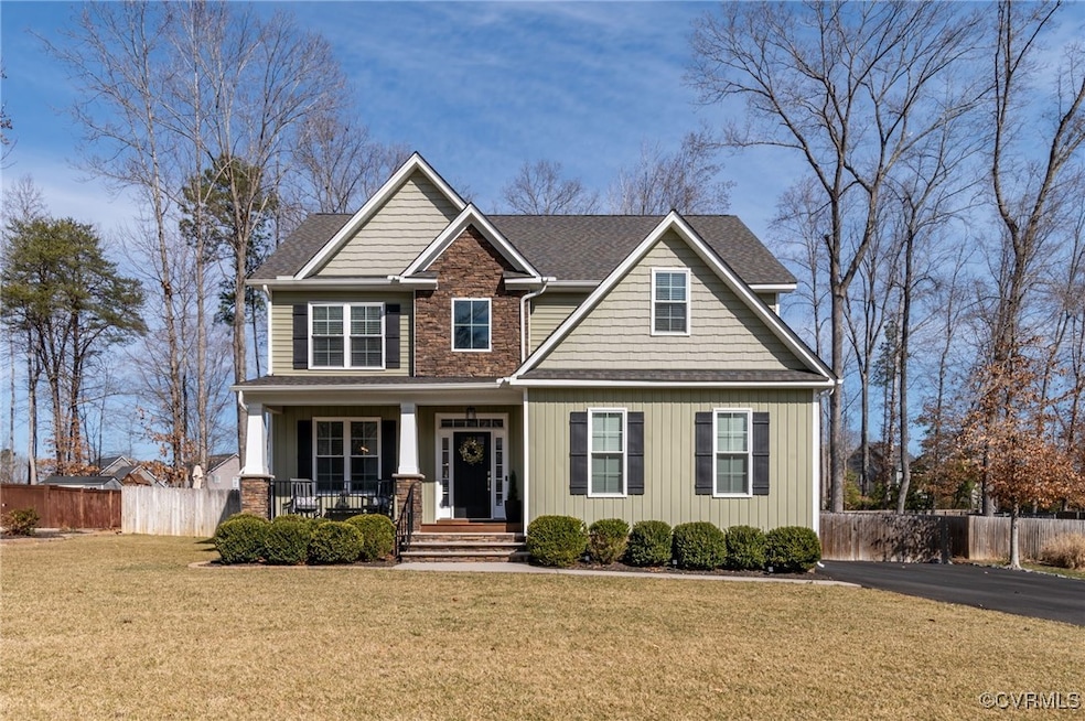 Craftsman inspired home featuring a shingled roof,