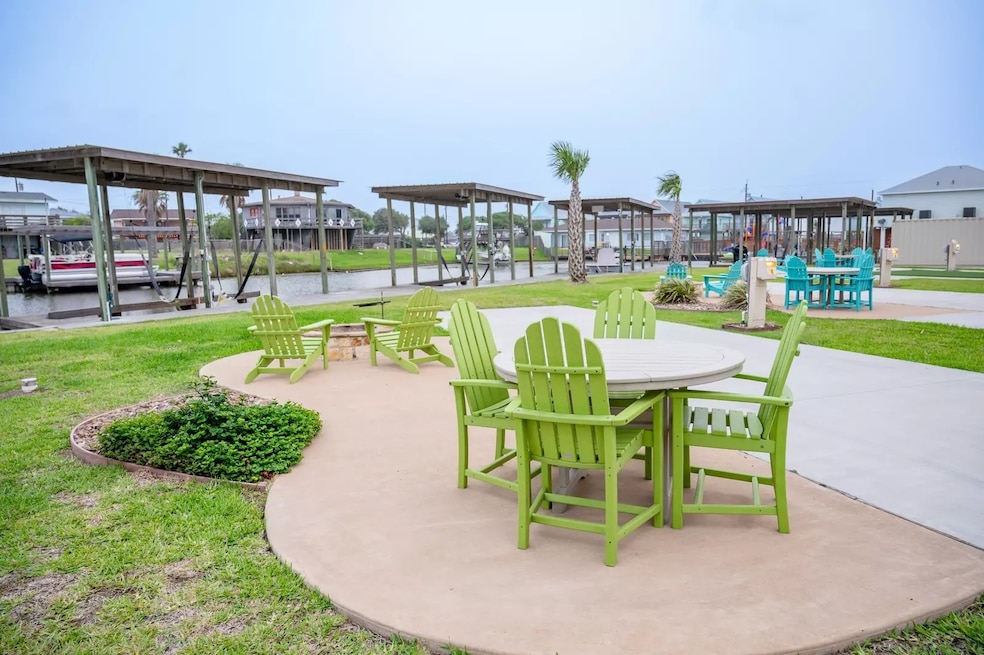 View of patio / terrace with a water view