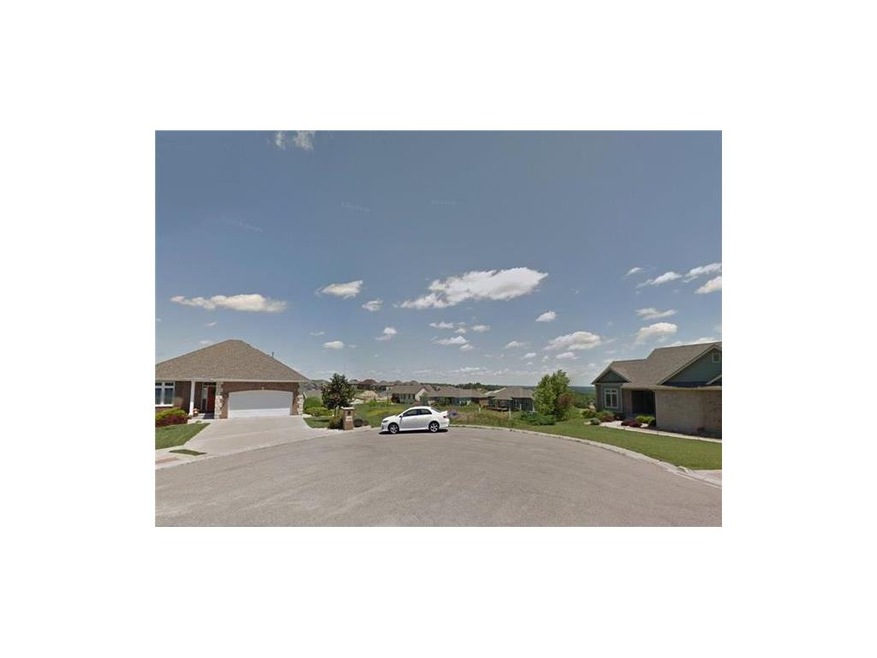 Welcome home to 3543 Everett Drive, a half acre wa