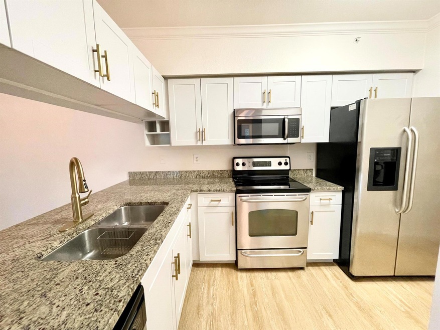 6511 Emerald Dunes Dr unit 203, West Palm Beach, FL 33411 - photo 1