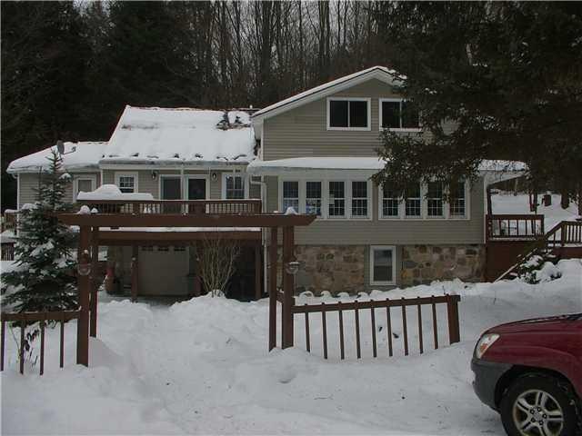 Exterior Front 4 bedroom, 3 bath home with blackto