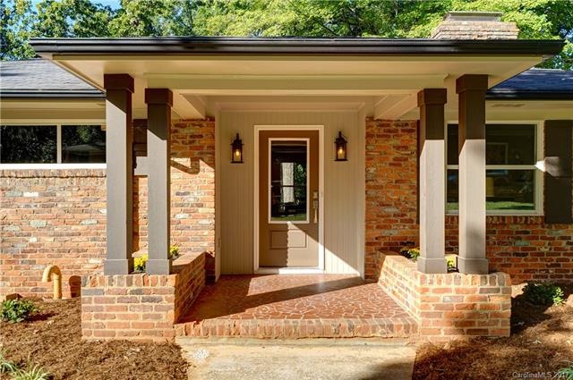 Welcome to the covered front entry porch of this f