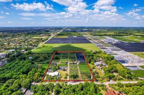 RENTAL OPPORTUNITY HOUSE ONLY ON APPX 1 AC OF A 5.5 AC REMAINDER CAN BE NEGIOTATED