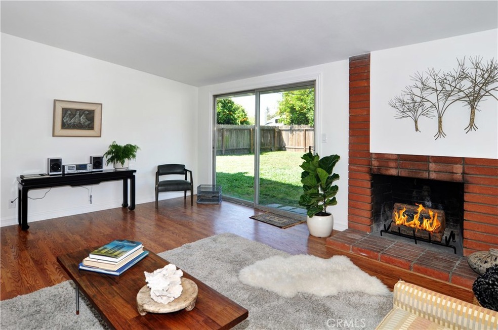 Spacious Living Room with Cozy Fireplace
