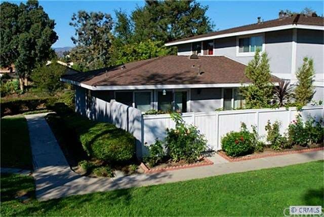 Highly desirable end unit with plenty of privacy.