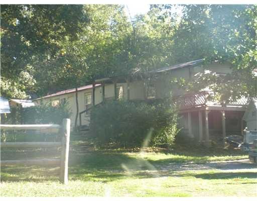 Exterior Front. 10 + acres, partially wooded with
