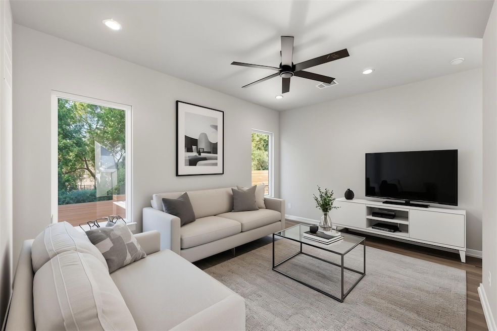 Living area with recessed lighting, wood finished