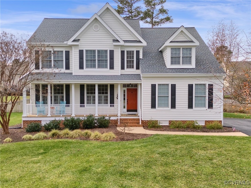 View of front of house featuring a porch and a fro