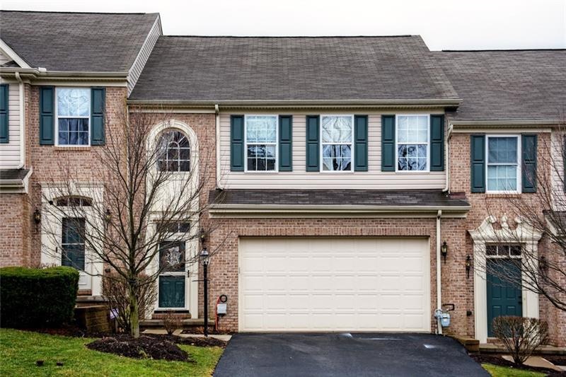 Enjoy maintenance-free living in this immaculate t