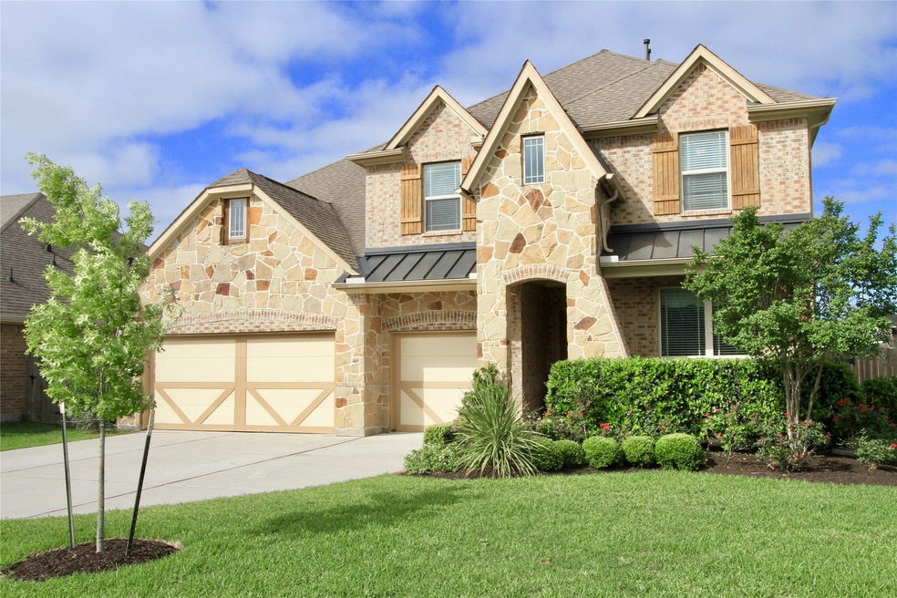 Enchanting Two Story, Four Bedroom, Three and a Half Bath Home with a Three Car Garage Located on a Large, Corner Lot. It's a MUST SEE!!