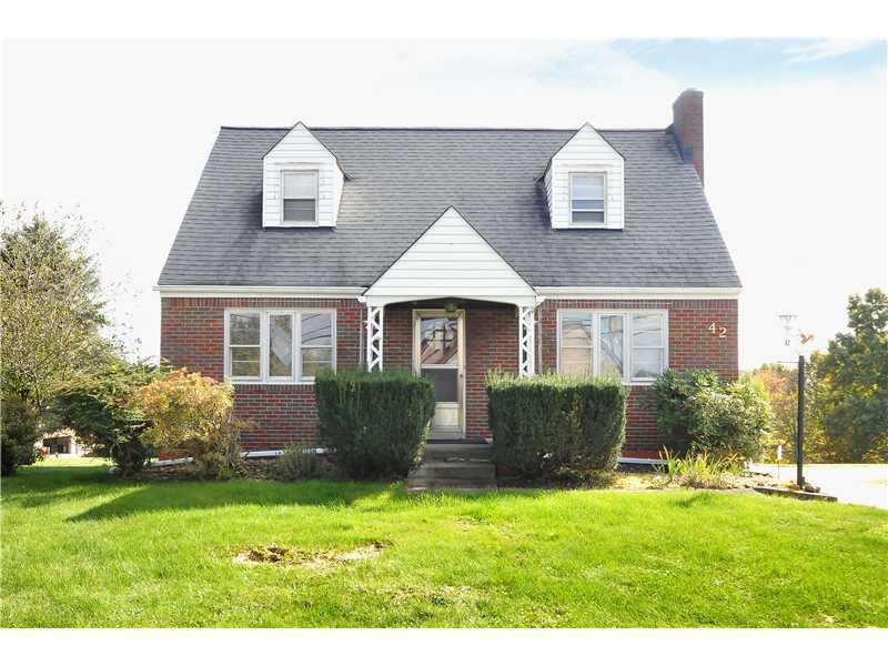 Exterior Front. This charming cape cod is much lar