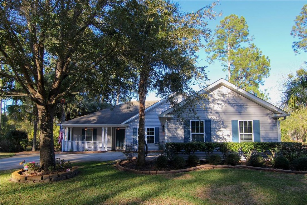 Front view, neighbors to the left and right but no