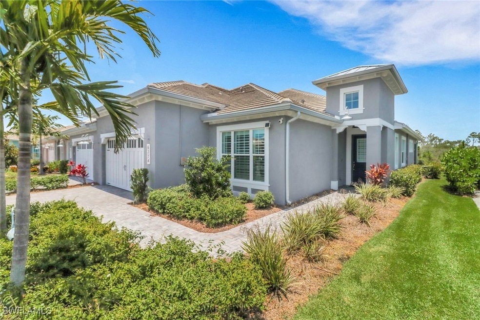 View of property exterior with beautiful covered f