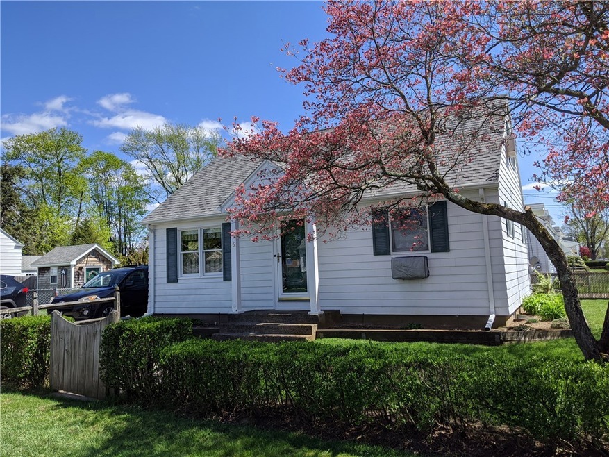 Meticulously maintained cape on corner lot!