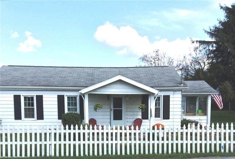 Own the American dream: A home with a white picket