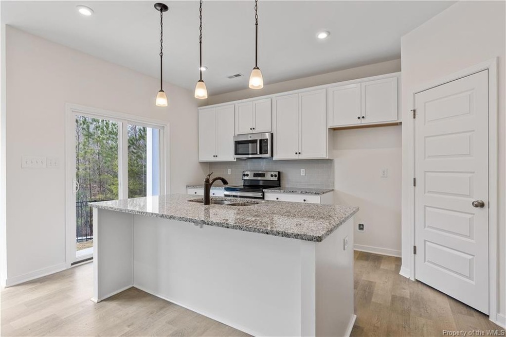 END UNIT TOWNHOME IS UNDER CONSTRUCTION - Photo is