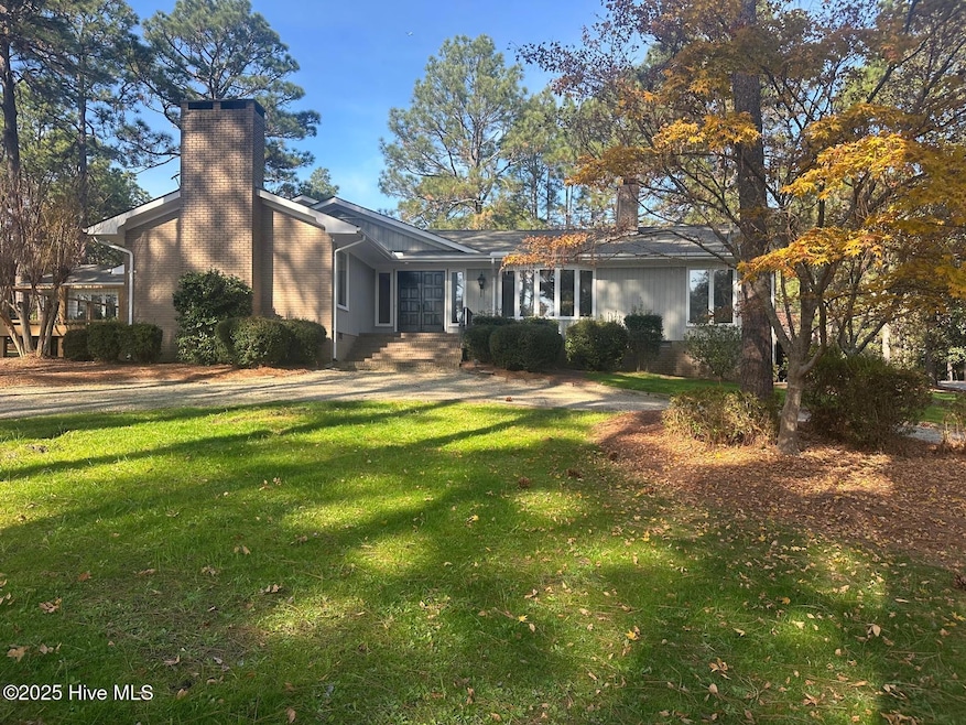 1 Country Club Blvd, Whispering Pines, NC 28327 - photo 1