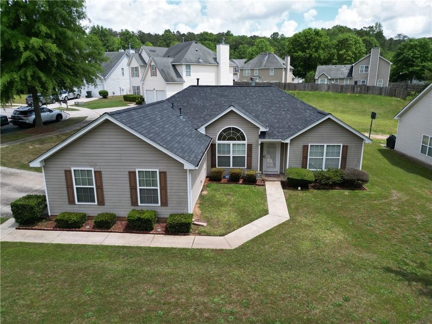 View of front of house featuring a front lawn