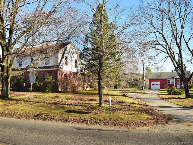 Two Homes Set on a nice flat Acre+ parecel in the 