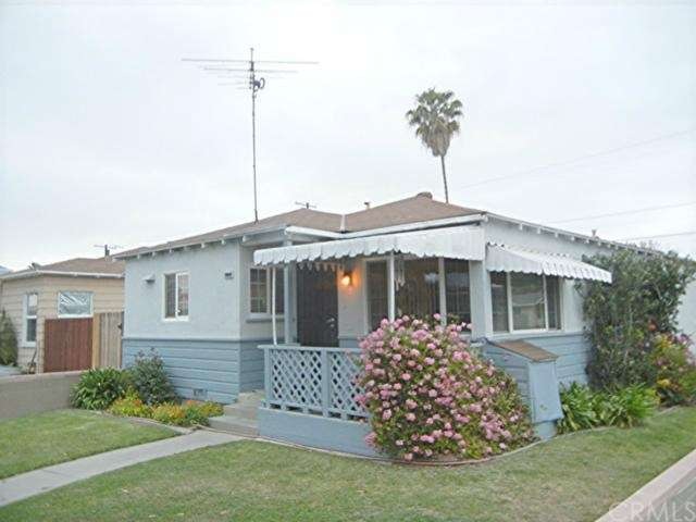 What an inviting house! Enjoy sitting on your porc