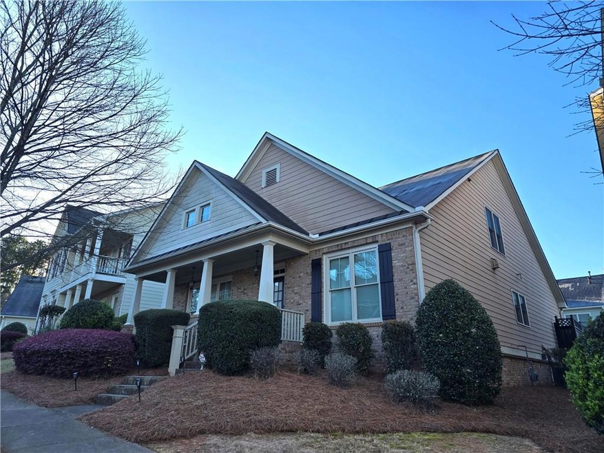 View of front of property with a balcony
