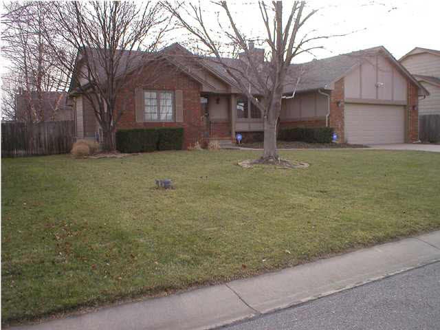 Front Exterior-Beautiful landscaping, inground spr