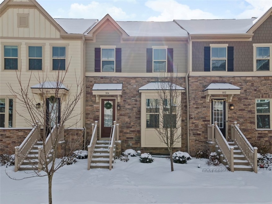 Welcome home to this stunning luxury townhome in V