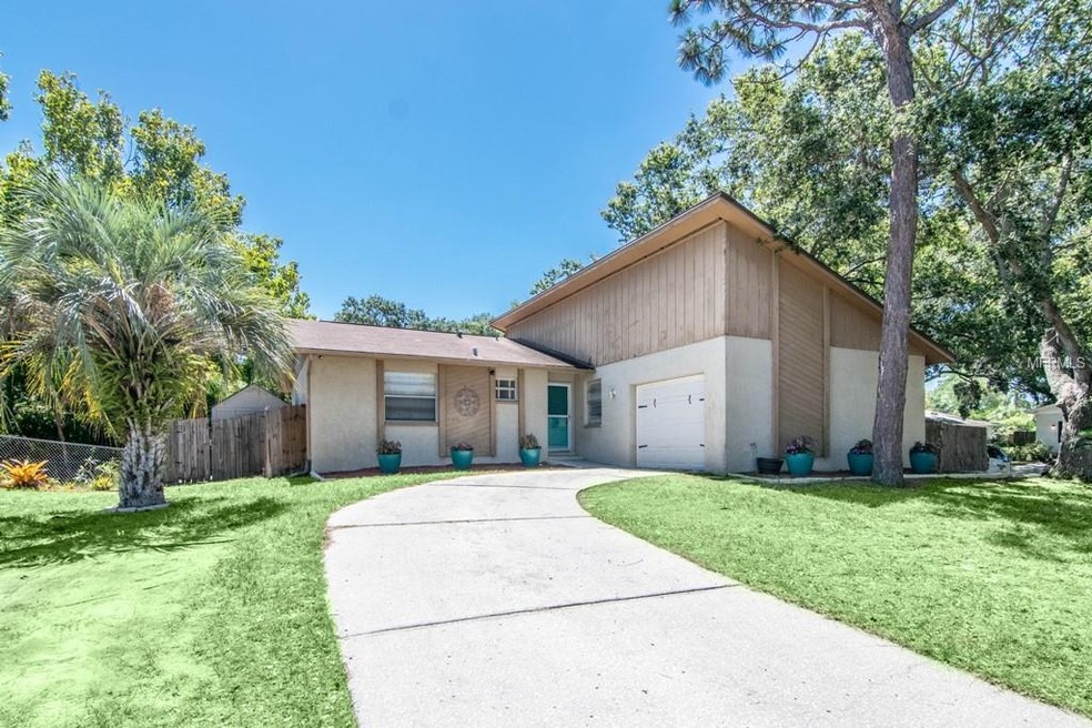 This home sits on a well sized corner lot with a f