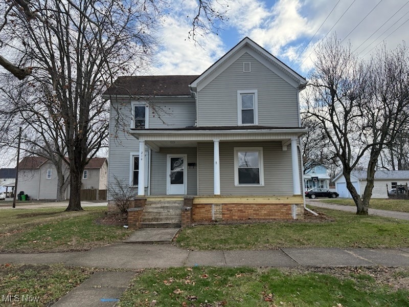 214 W 7th St, Uhrichsville, OH 44683 - photo 1