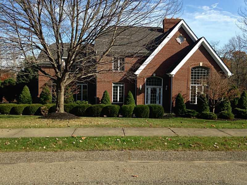 Exterior Front. Gorgeous brick home with water vie